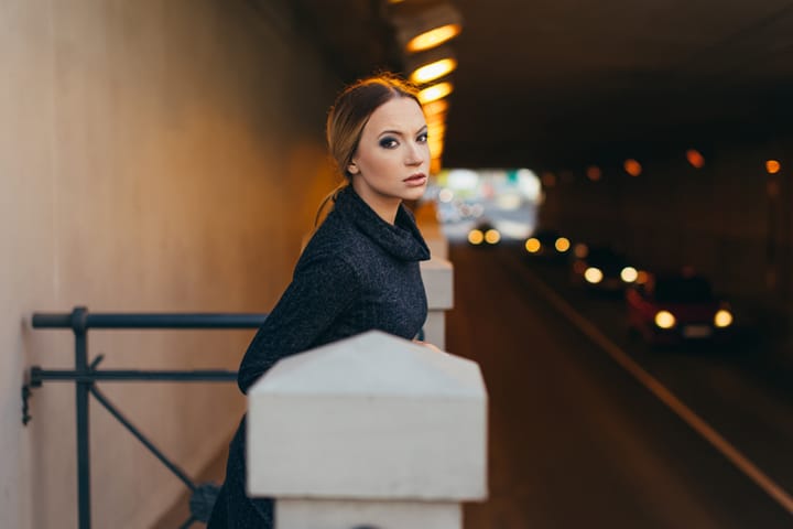 woman tunnel viewing traffic
