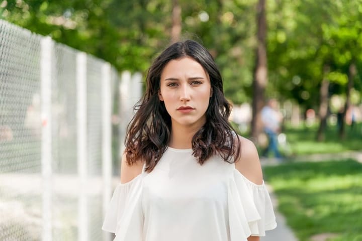 Portrait Of A Sad Woman looking at the camera