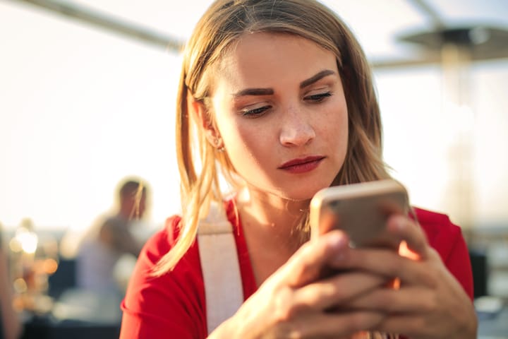 Young girl using her smart phone