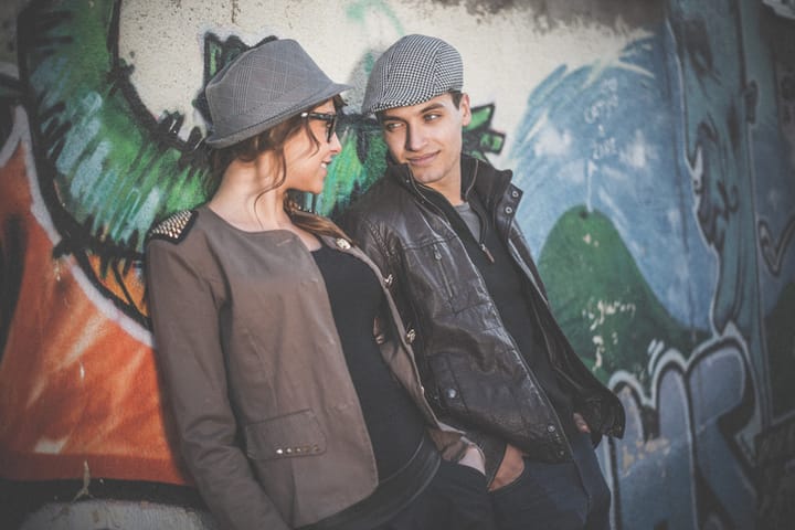 Couple flirting outdoors in the city