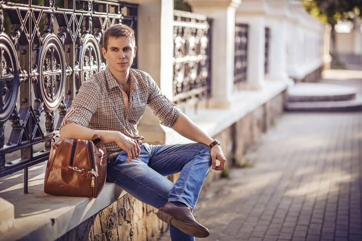 Handsome man resting in casual closing