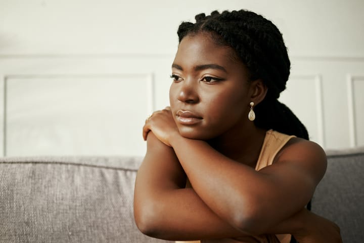 sad woman looking forlorn