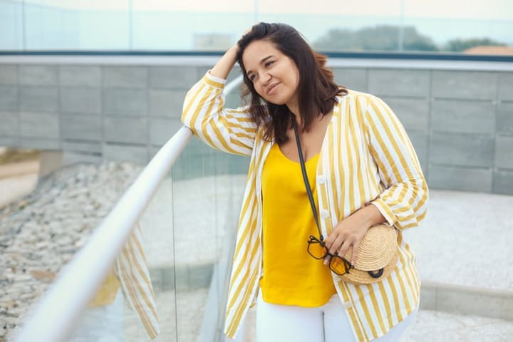 upset woman in yellow top
