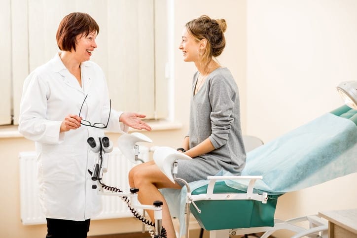 11 Questions To Ask Your OBGYN When Your Feet Are In The Stirrups