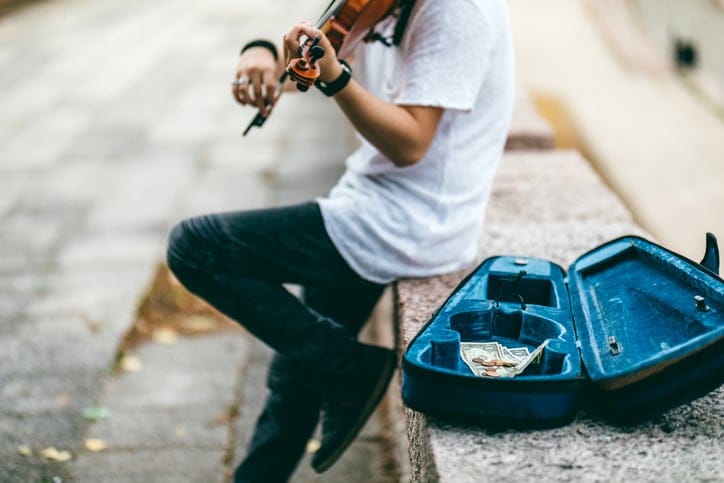Police Say People Pretending To Play Violin For Money Is A ‘Nationwide Issue’