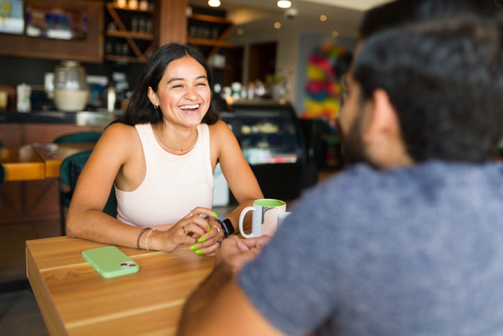 16 Real Signs A Guy Is Flirting WIth You (& What To Do About It When It’s Unwanted)