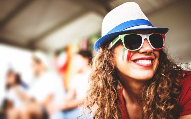 woman in sunglasses at sports match