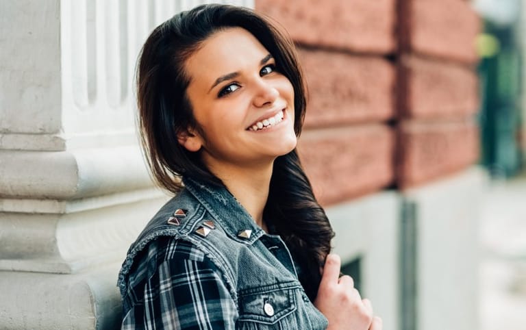 Brunette young lady smiling