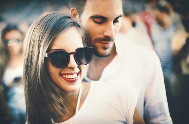 happy couple laughing sunglasses