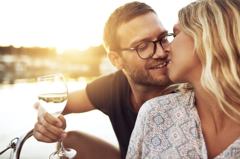 Couple kissing on romantic date