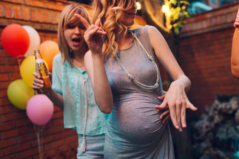 pregnant woman dancing at party