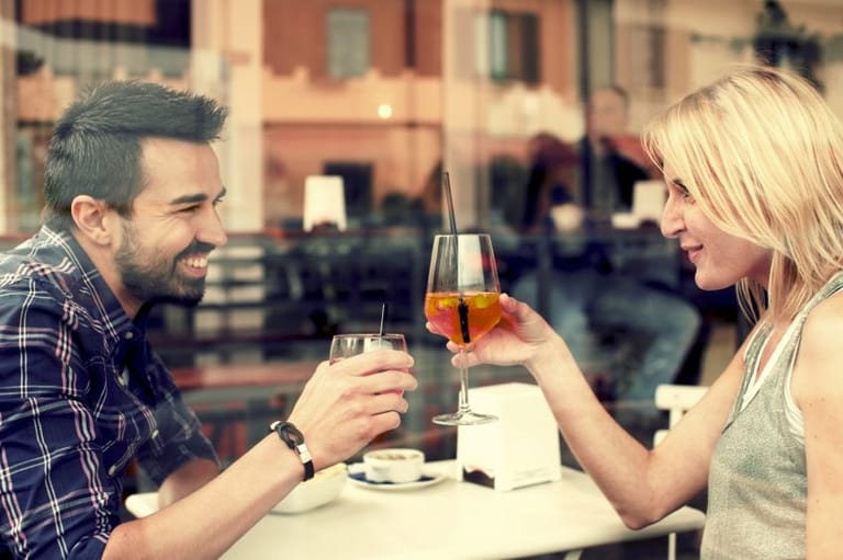 Couple drinking at bar