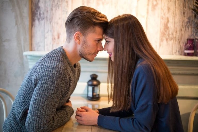 Couple looking at each other