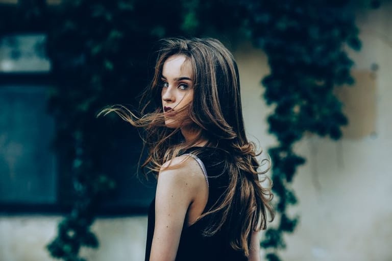 Attractive fashion woman in black dress