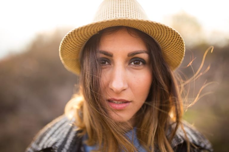 Brunette wearing hat