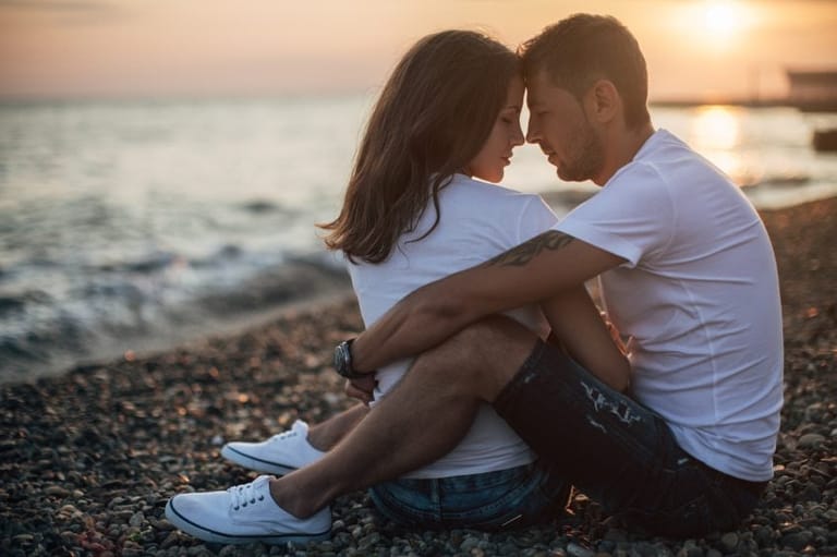 Young lovers on the beach
