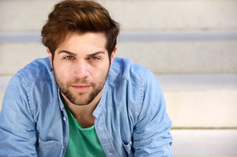 cute guy serious camera