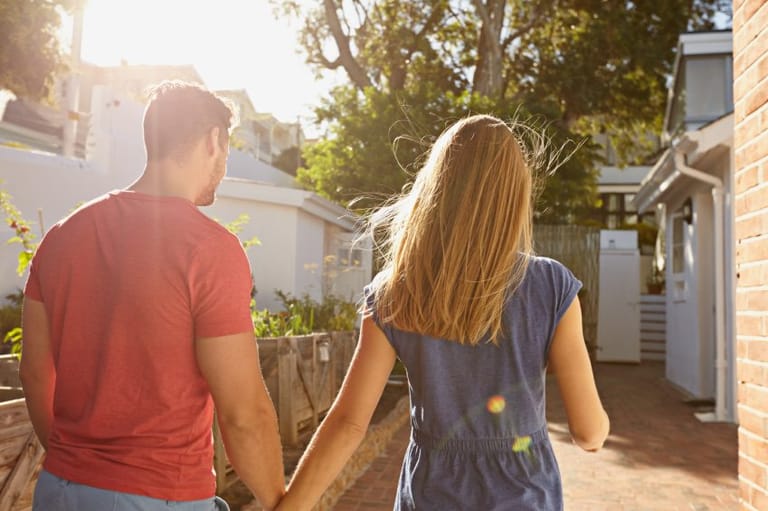 couple walking holding hands