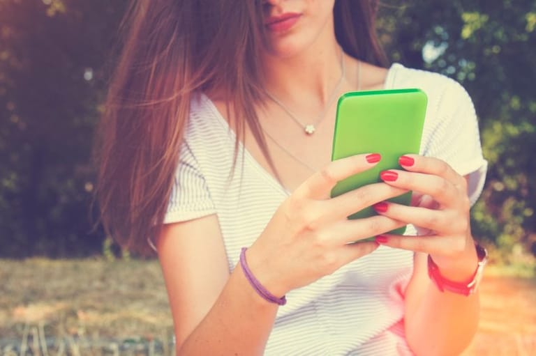 woman texting phone