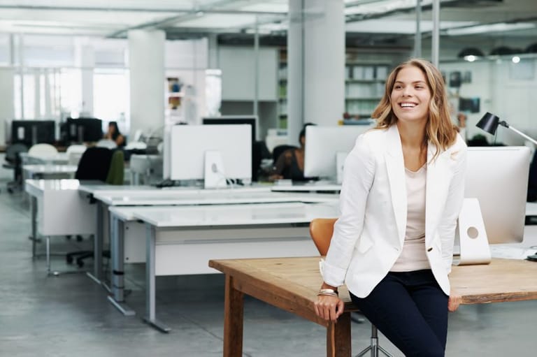 Woman sitting on her office.