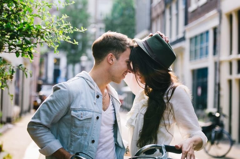 Young couple head to head