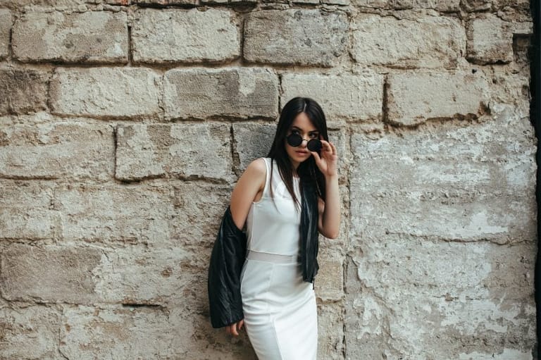 Attractive fashion woman in white dress