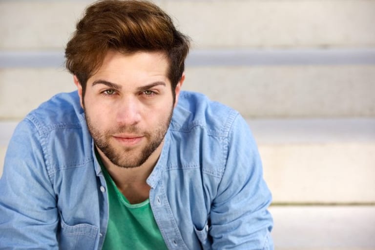 cute guy serious camera