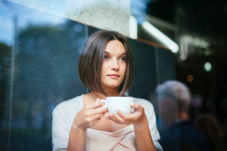 Beautiful woman with coffee cup
