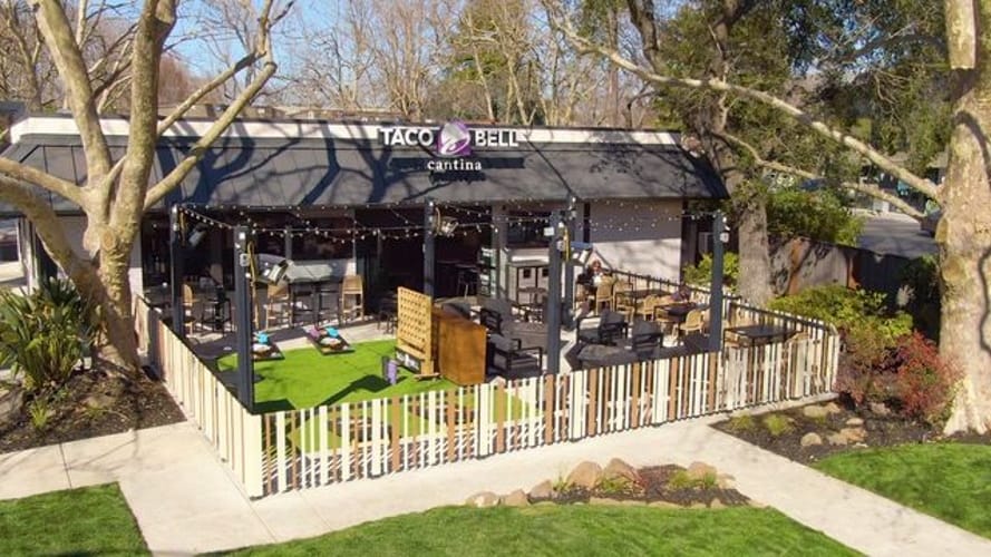 Taco Bell Has Opened A New Restaurant With An Outdoor Fire Pit And Games Area