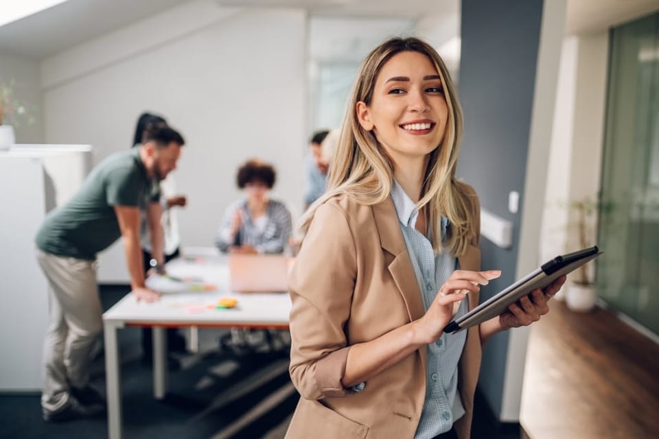 Businesswoman looking confident in her office.