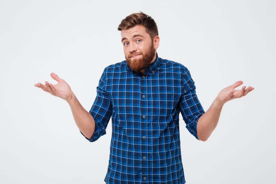 Man shrugging his shoulders.