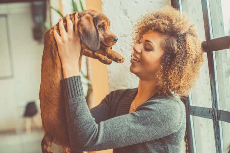 Biracial girl with puppy