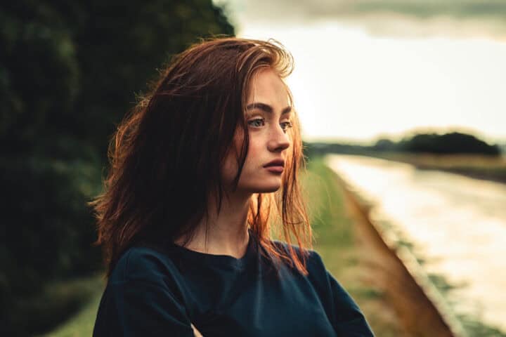 long haired brunette sad