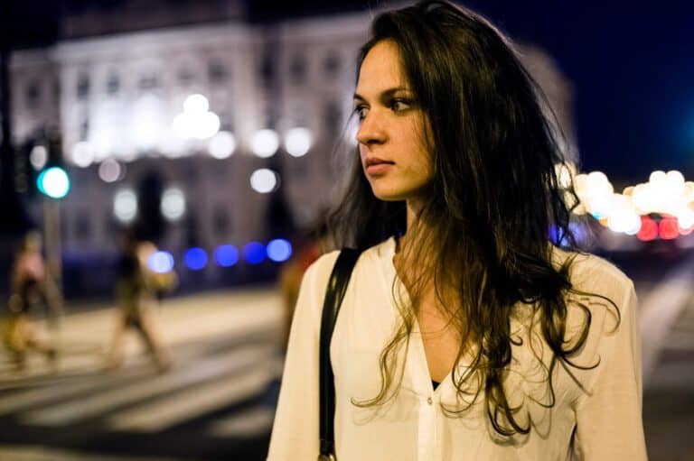 Woman walking alone at night