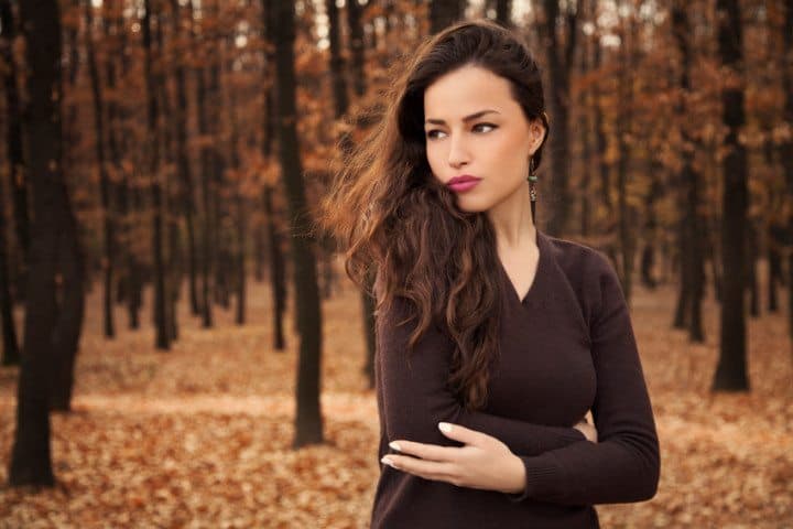 brunette in the woods
