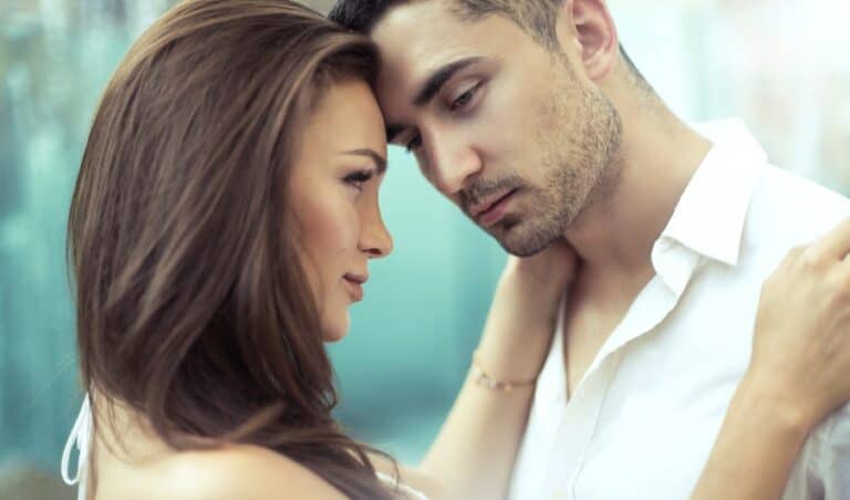Young attractive couple holding each other