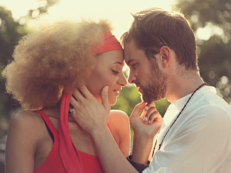 Biracial couple in sunset