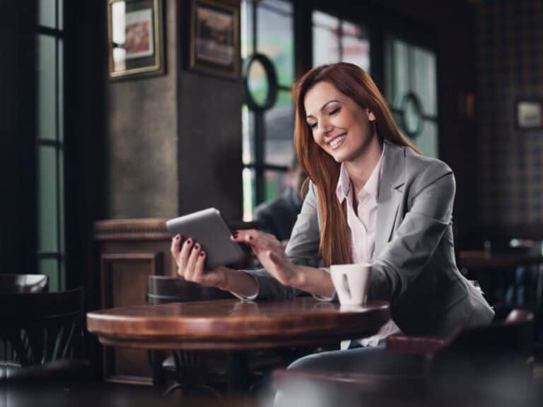 Businesswoman looking at tablet
