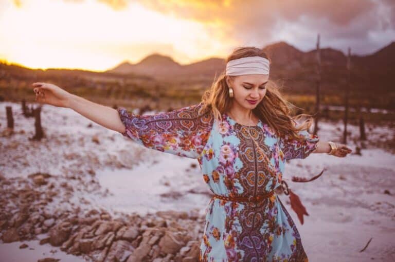 Boho girl dancing in floral dress