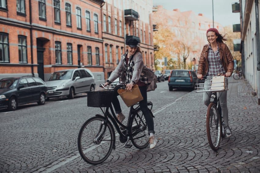 Two girls on bikes