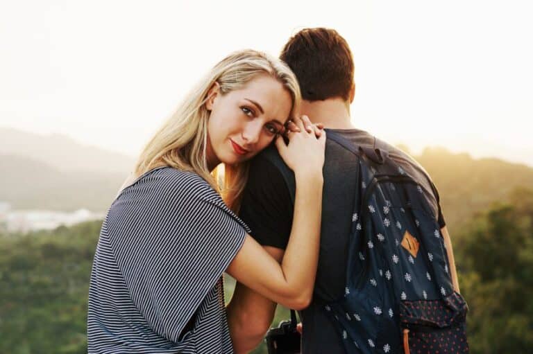 Couple woman looking over shoulder