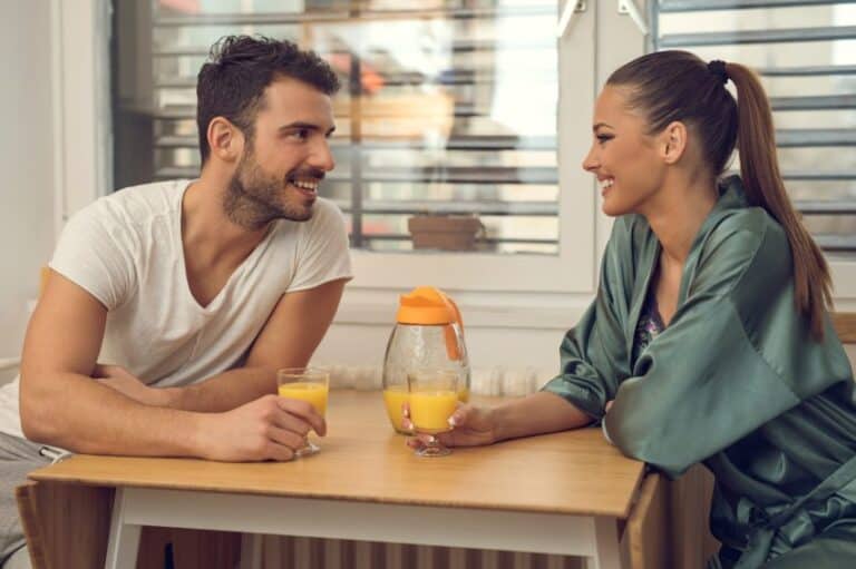 Young smiling couple communicating