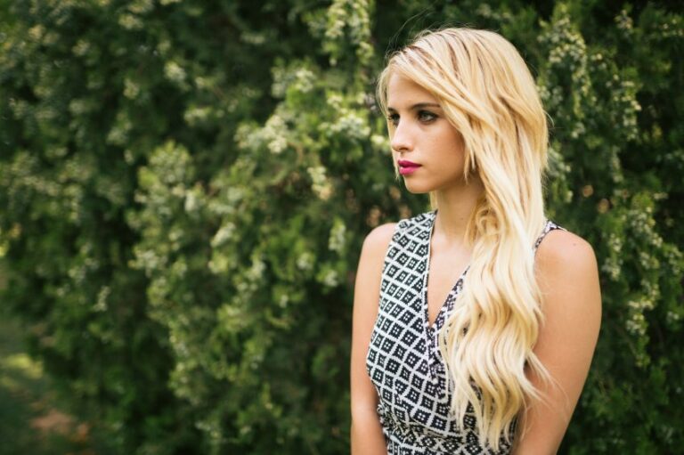 Blonde woman near nature
