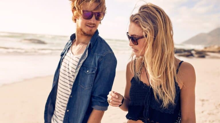 Young couple walking on the beach