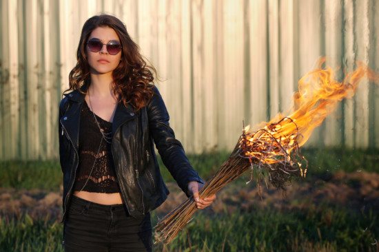 woman with flaming torch