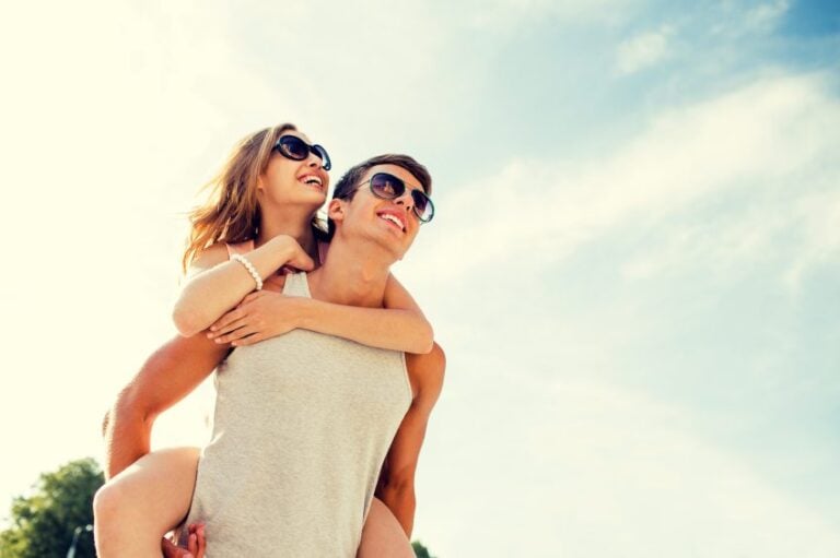 happy couple sunshine sunglasses