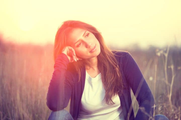thoughtful woman portrait field