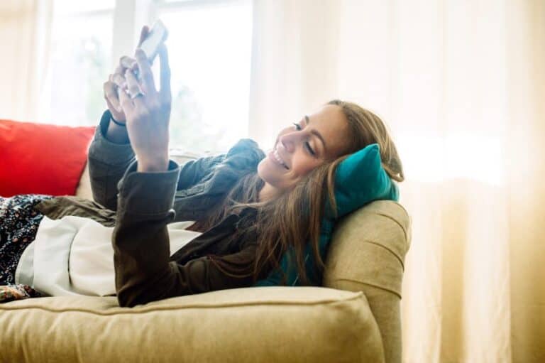 woman texting phone tinder