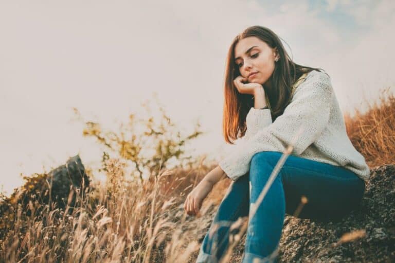 woman sad in heather