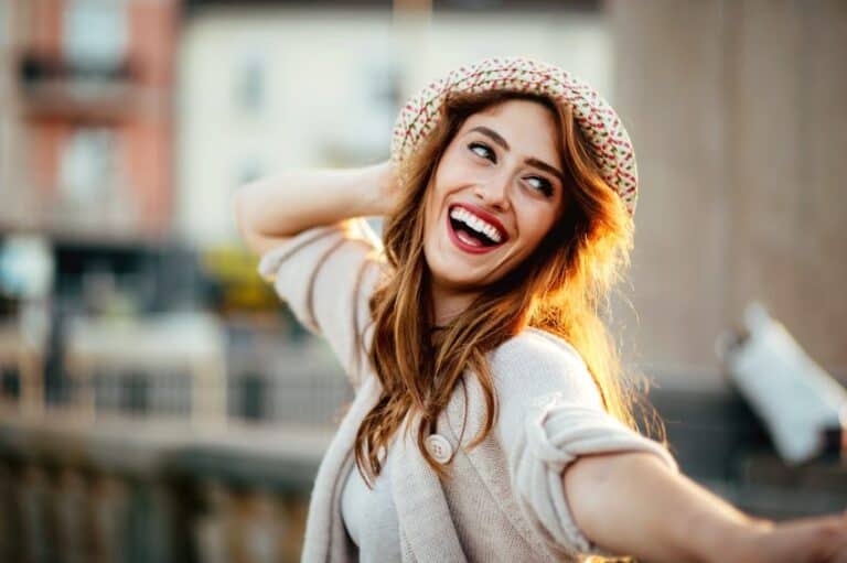 woman smiling sun selfie